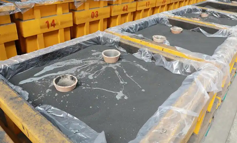 Piezas terminadas de hierro fundido empaquetadas para exportación: entrega global a tiempo desde la fábrica de Wuxi